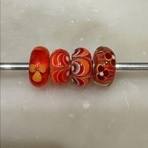 Trollbeads Set of orange beads